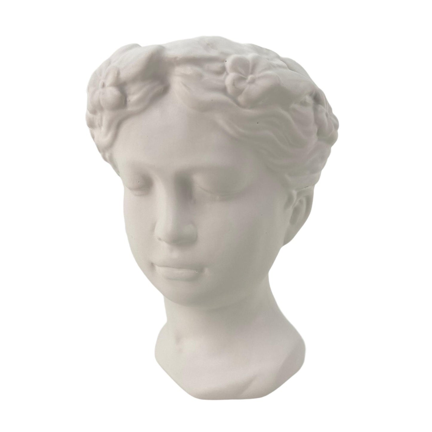 Porta maceta en forma de rostro