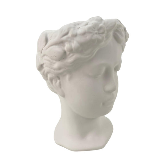 Porta maceta en forma de rostro